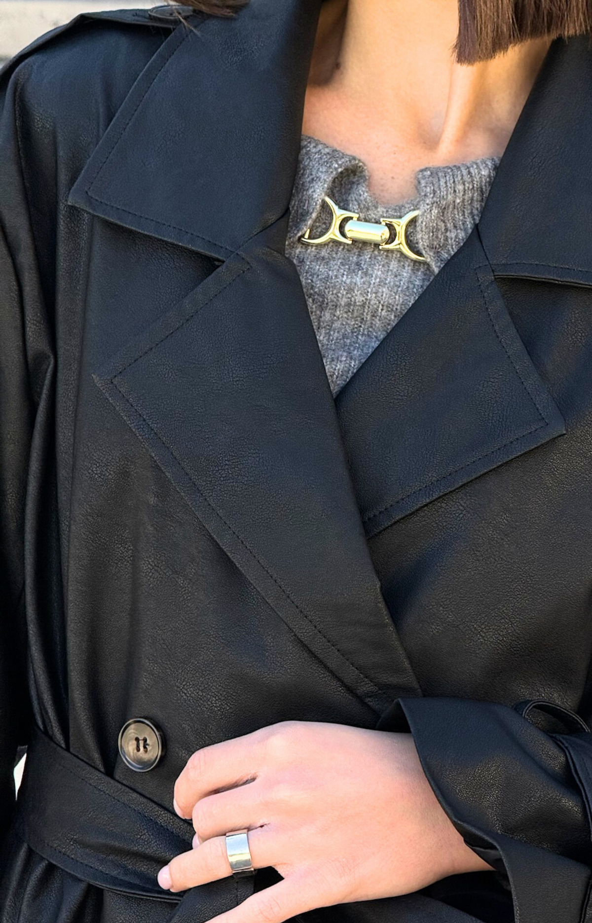 Step out in style with our Kylie Faux Leather Trench Coat, expertly crafted from high-quality faux leather that mimics the rich texture and sheen of genuine leather. This chic coat not only adds a touch of sophistication to any outfit but also provides a cruelty-free alternative that you can feel good about wearing.&nbsp;Featuring premium faux leather fabric, deep pockets, and a fashionable belt.