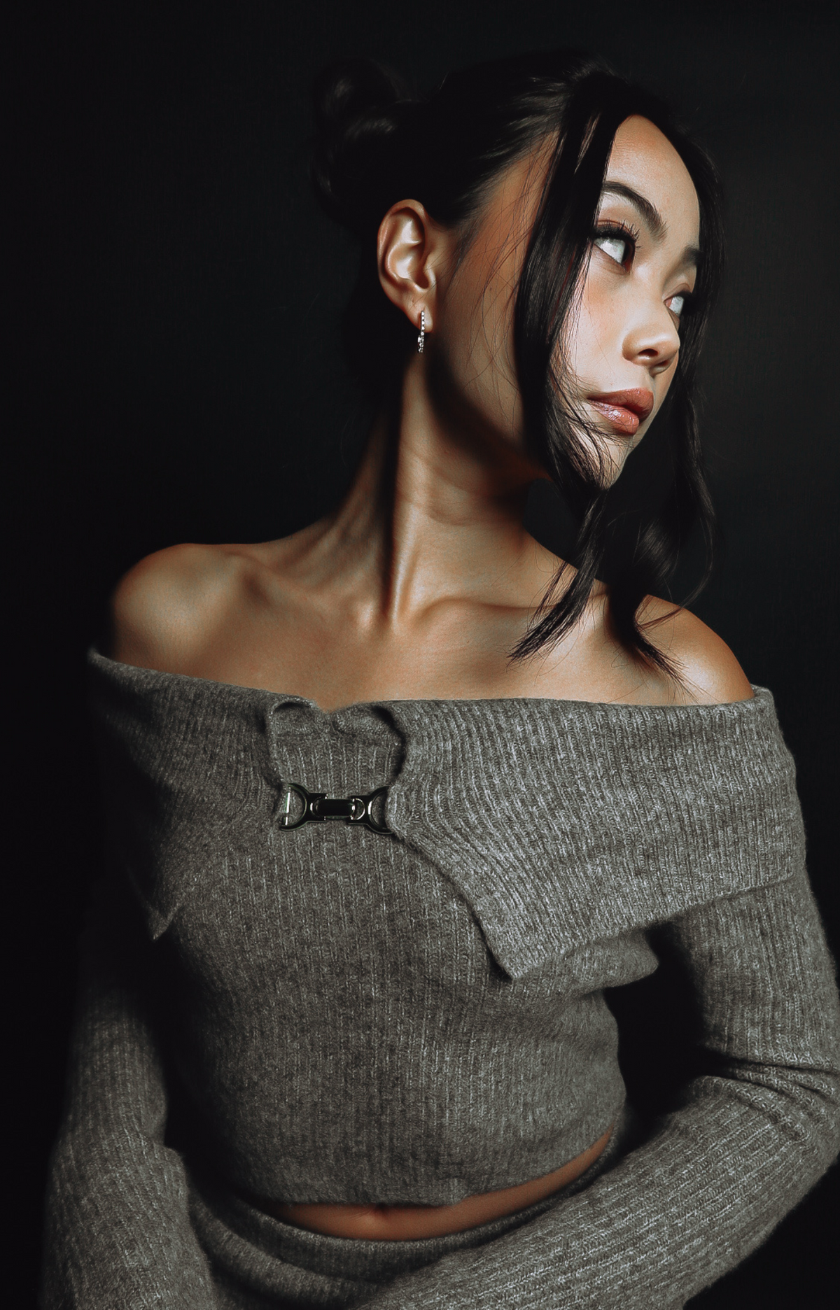 Embrace effortless elegance with the Lorena Sweater Knit Top. Featuring a stunning off-shoulder design, this top adds a touch of sophistication to any outfit. Crafted with an ultra-soft knit fabric, it delivers unmatched comfort while keeping you chic and stylish. Pair it with the matching Lorena Sweater Knit Mini Skirt for a coordinated, head-turning look that's perfect for any occasion.