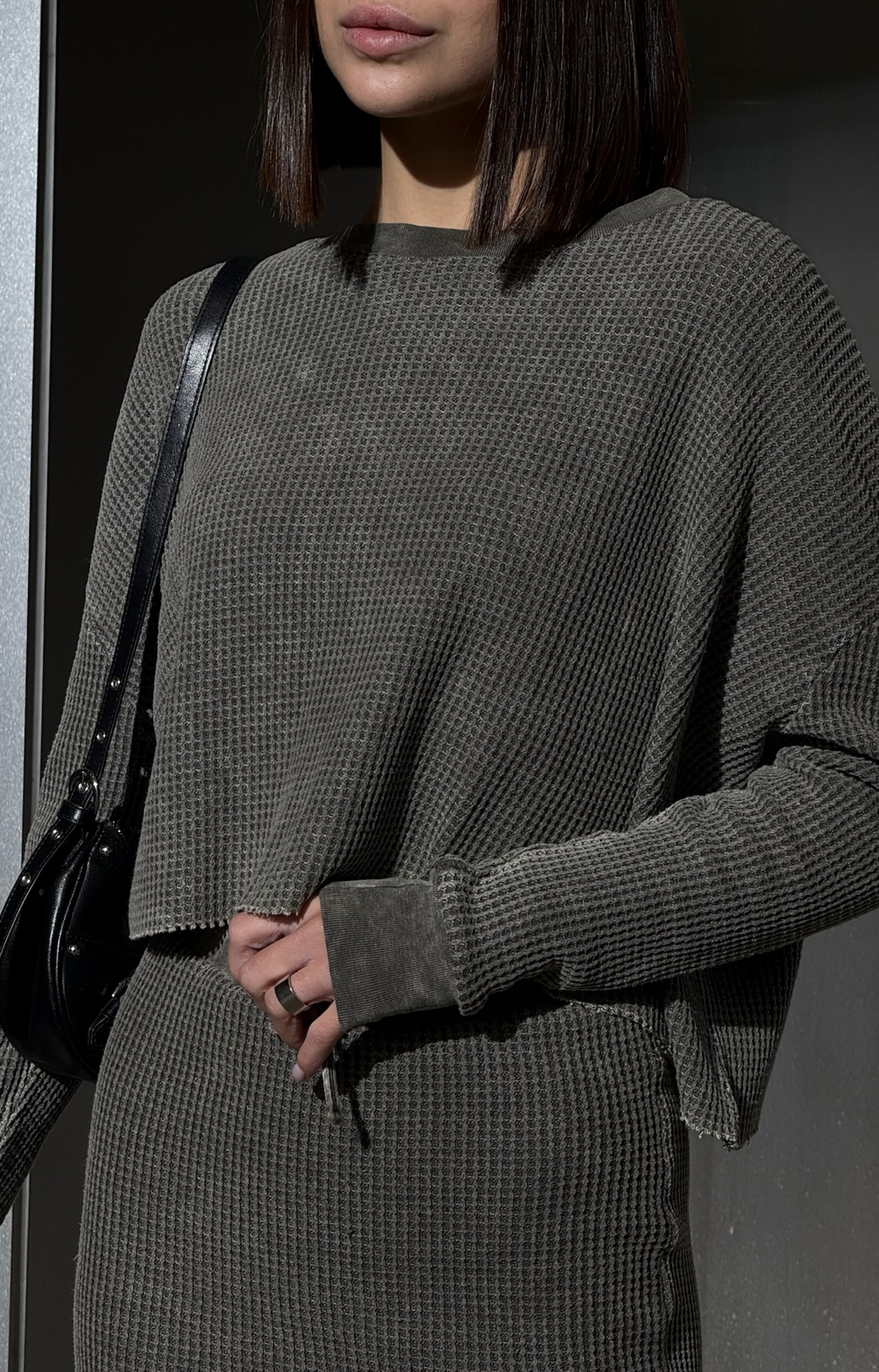 Discover the Tina Rib Long Sleeve Knit Top, crafted from soft cotton fabric for ultimate comfort. Featuring rib cuffs and an easy-wear design, this stylish rib knit top is perfect for any occasion. Pair it with the matching Tina Rib Knit Skirt for a complete look!