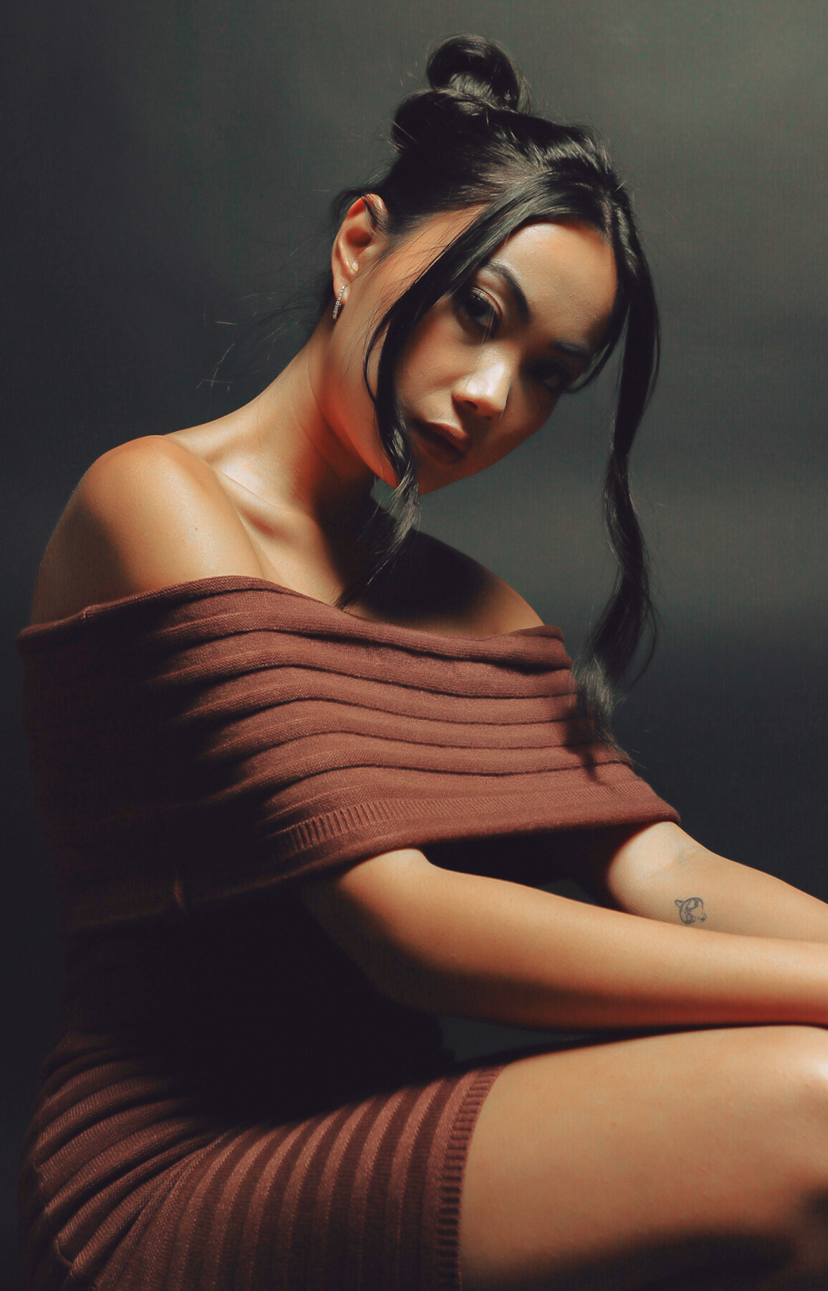Make a statement with the Theo Off-Shoulder Knit Dress in rich dark chocolate hue. Featuring a chic off-shoulder neckline and subtle stripe pattern, this dress exudes elegance and sophistication. Crafted from ultra-soft, stretchy knit fabric, it offers a flattering fit that's both comfortable and classy. Perfect for date nights, holiday parties, or upscale casual events, the Theo dress is your go-to for effortless style.&nbsp;