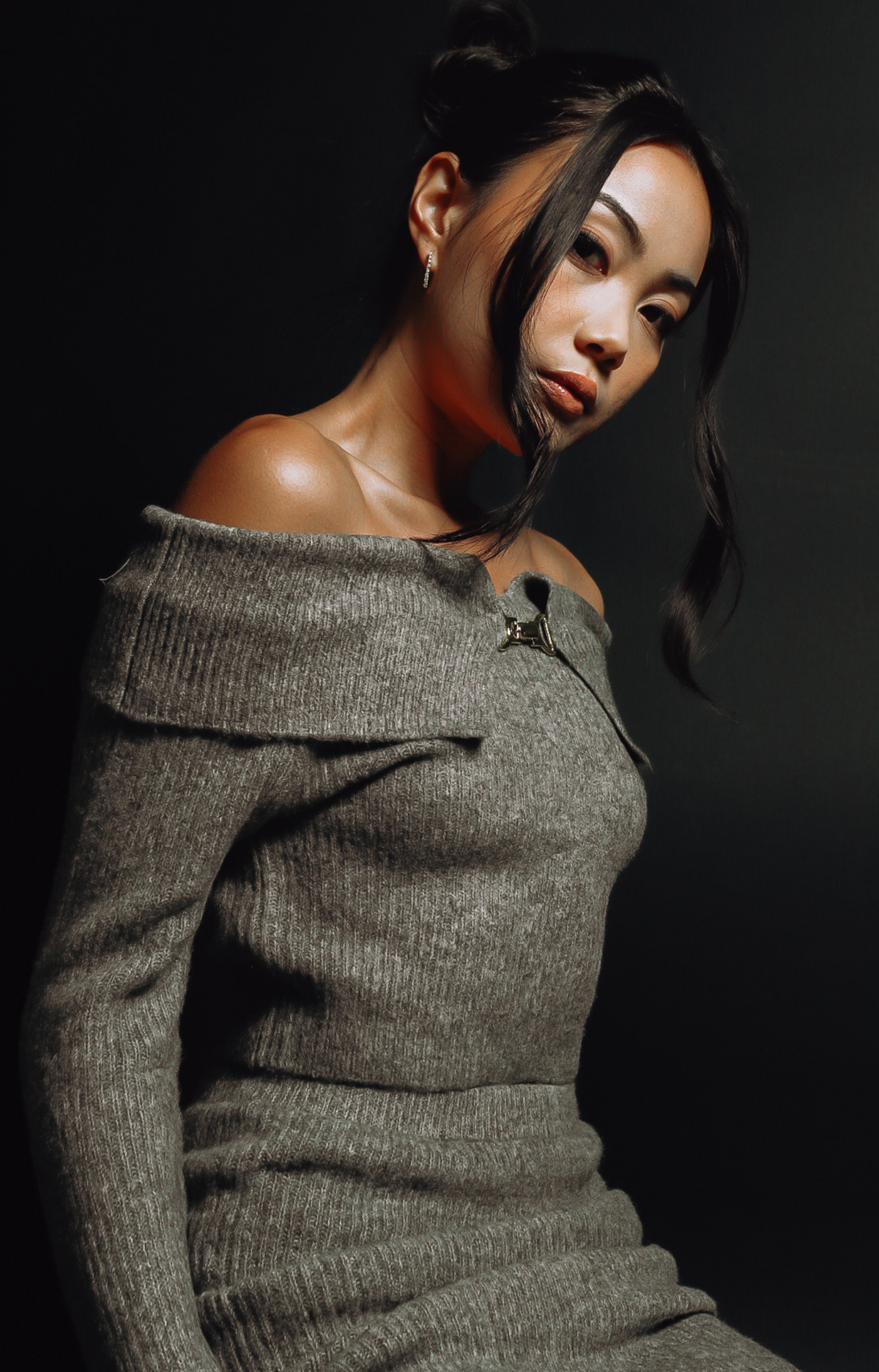 Embrace effortless elegance with the Lorena Sweater Knit Top. Featuring a stunning off-shoulder design, this top adds a touch of sophistication to any outfit. Crafted with an ultra-soft knit fabric, it delivers unmatched comfort while keeping you chic and stylish. Pair it with the matching Lorena Sweater Knit Mini Skirt for a coordinated, head-turning look that's perfect for any occasion.