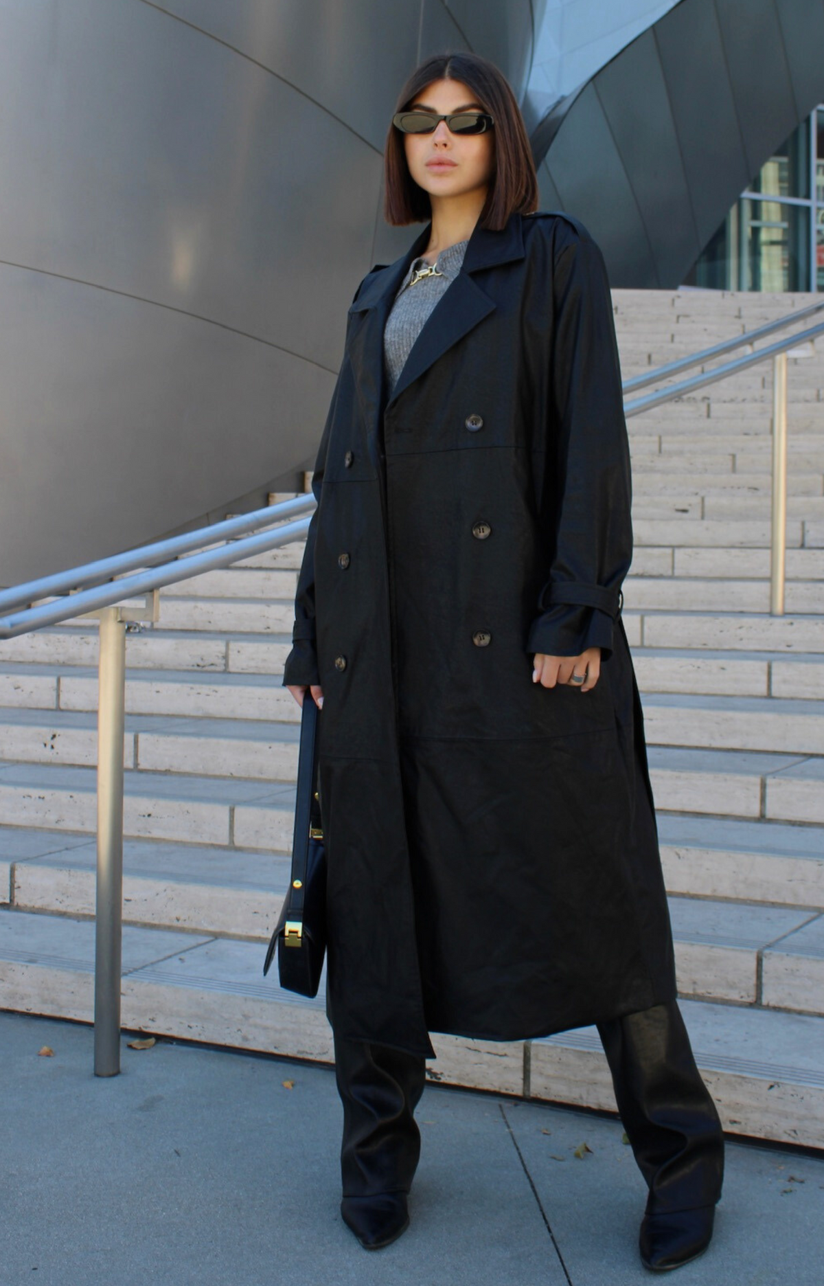 Step out in style with our Kylie Faux Leather Trench Coat, expertly crafted from high-quality faux leather that mimics the rich texture and sheen of genuine leather. This chic coat not only adds a touch of sophistication to any outfit but also provides a cruelty-free alternative that you can feel good about wearing.&nbsp;Featuring premium faux leather fabric, deep pockets, and a fashionable belt.