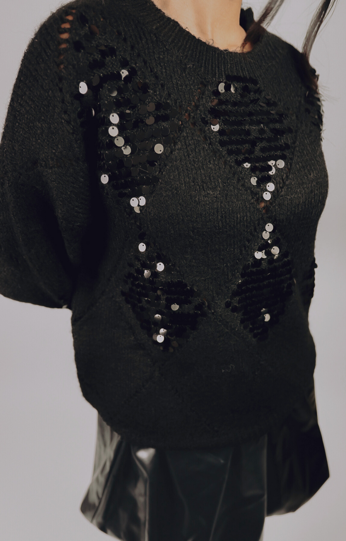 Elevate your holiday wardrobe with the Julia Sequined Knit Sweater. This ultra-soft knit blends cozy comfort with chic sequined details, making it the perfect choice for festive gatherings or casual outings. Dress it up with a sleek skirt or keep it relaxed with your favorite jeans. Versatile, stylish, and holiday-ready, the Julia sweater is a must-have for a touch of sparkle this season.