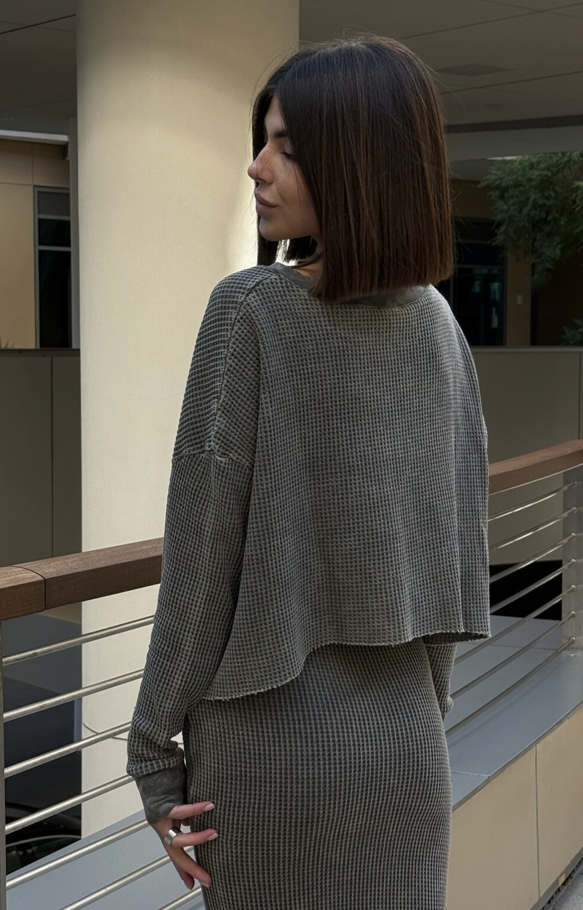 Discover the Tina Rib Long Sleeve Knit Top, crafted from soft cotton fabric for ultimate comfort. Featuring rib cuffs and an easy-wear design, this stylish rib knit top is perfect for any occasion. Pair it with the matching Tina Rib Knit Skirt for a complete look!