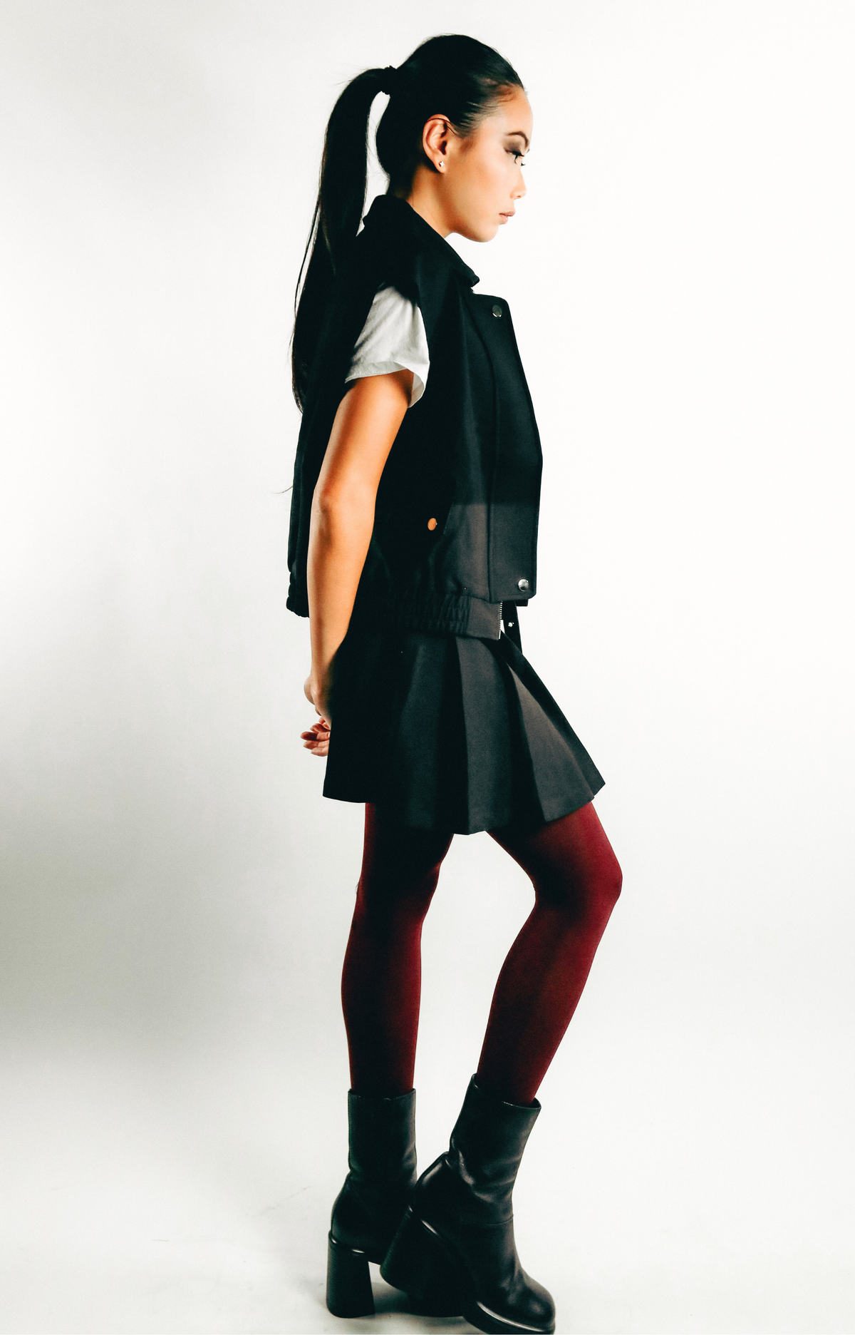Elevate your wardrobe with the Jen Pleated Mini Skirt, where chic style meets modern design. This tailored skirt features flattering pleats and a self belt that adds a touch of sophistication to your look. Designed with a convenient side zipper, the Jen Mini Skirt combines functionality with a trendy silhouette. Effortlessly stylish, it’s perfect for creating fashionable outfits that stand out. Step out in confidence with this must-have mini skirt that embodies a hip, contemporary vibe.