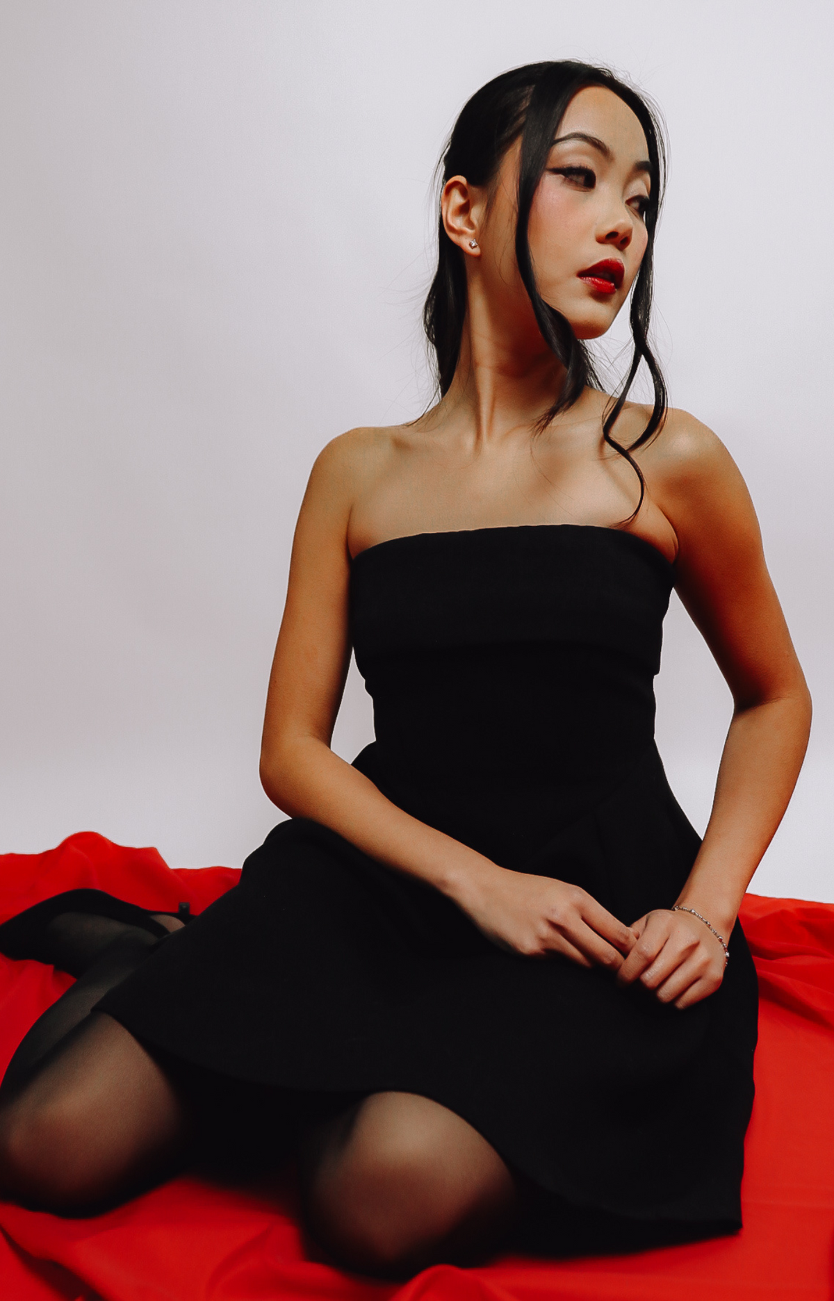 The Cora Strapless Mini Dress is the ultimate little black dress for every occasion. Made with stretchy fabric, and a chic, timeless design, it's perfect for date night, parties, and special events. Flattering and versatile, the Cora dress will have you looking effortlessly elegant anytime, anywhere.
