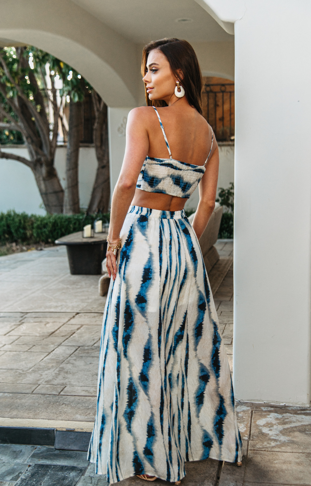 Discover effortless elegance with our Luna Linen Long Slit Skirt. Designed for comfort, it features an elastic back waistband and a slit front detail with a side invisible zipper for practical wear. Crafted from lightweight, breezy linen fabric and lined for quality, this linen maxi skirt is perfect for vacationing in style. Pair it with our Luna Linen Smocked Back Crop Top for an elegant and chic ensemble.