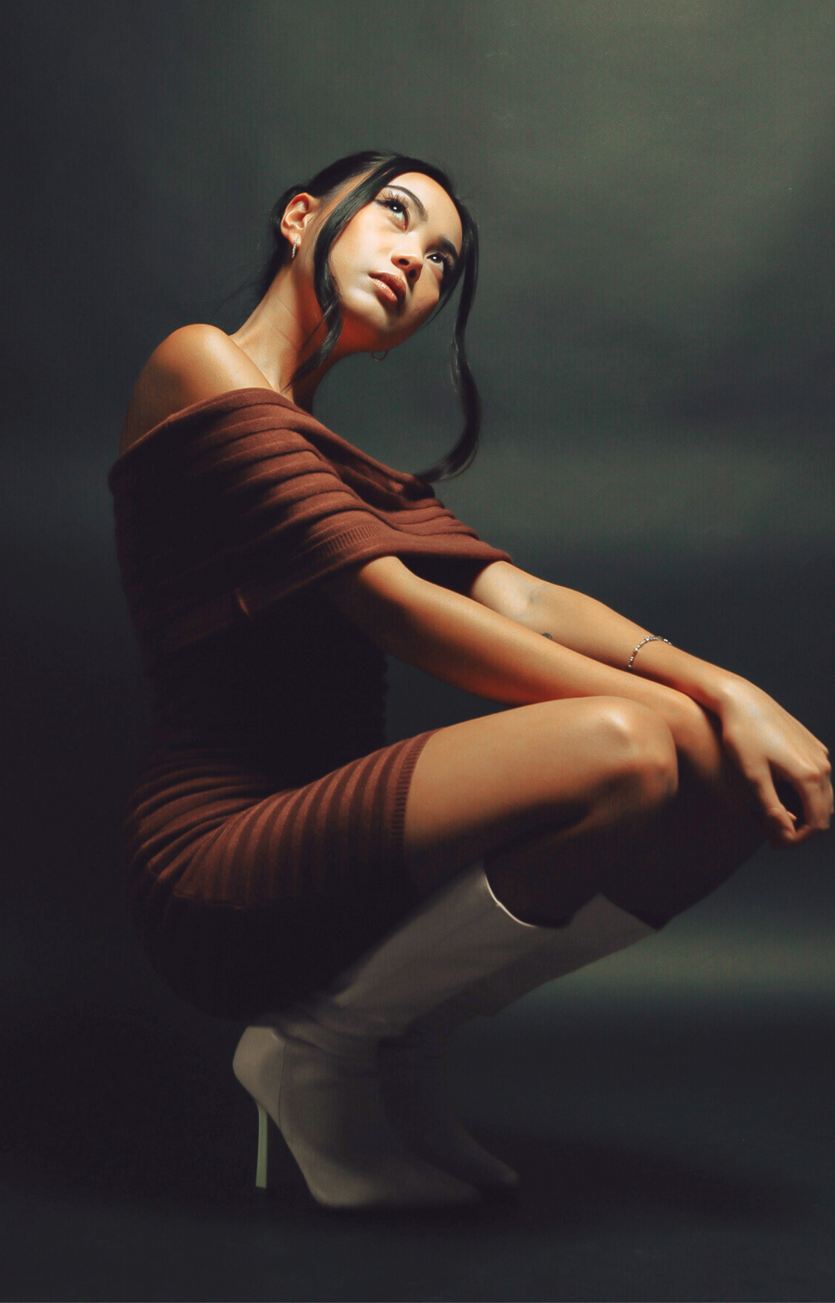Make a statement with the Theo Off-Shoulder Knit Dress in rich dark chocolate hue. Featuring a chic off-shoulder neckline and subtle stripe pattern, this dress exudes elegance and sophistication. Crafted from ultra-soft, stretchy knit fabric, it offers a flattering fit that's both comfortable and classy. Perfect for date nights, holiday parties, or upscale casual events, the Theo dress is your go-to for effortless style.&nbsp;