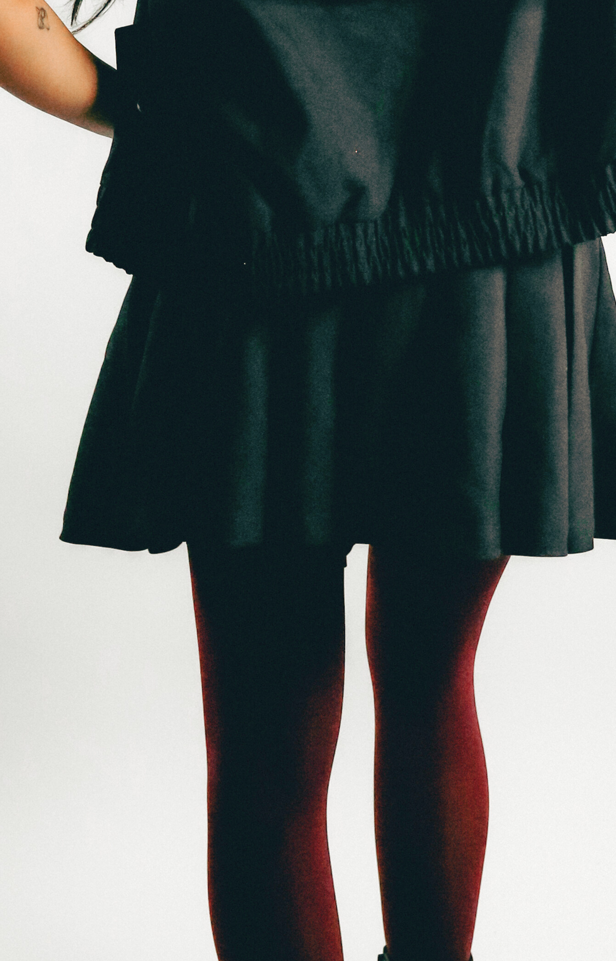 Elevate your wardrobe with the Jen Pleated Mini Skirt, where chic style meets modern design. This tailored skirt features flattering pleats and a self belt that adds a touch of sophistication to your look. Designed with a convenient side zipper, the Jen Mini Skirt combines functionality with a trendy silhouette. Effortlessly stylish, it’s perfect for creating fashionable outfits that stand out. Step out in confidence with this must-have mini skirt that embodies a hip, contemporary vibe.