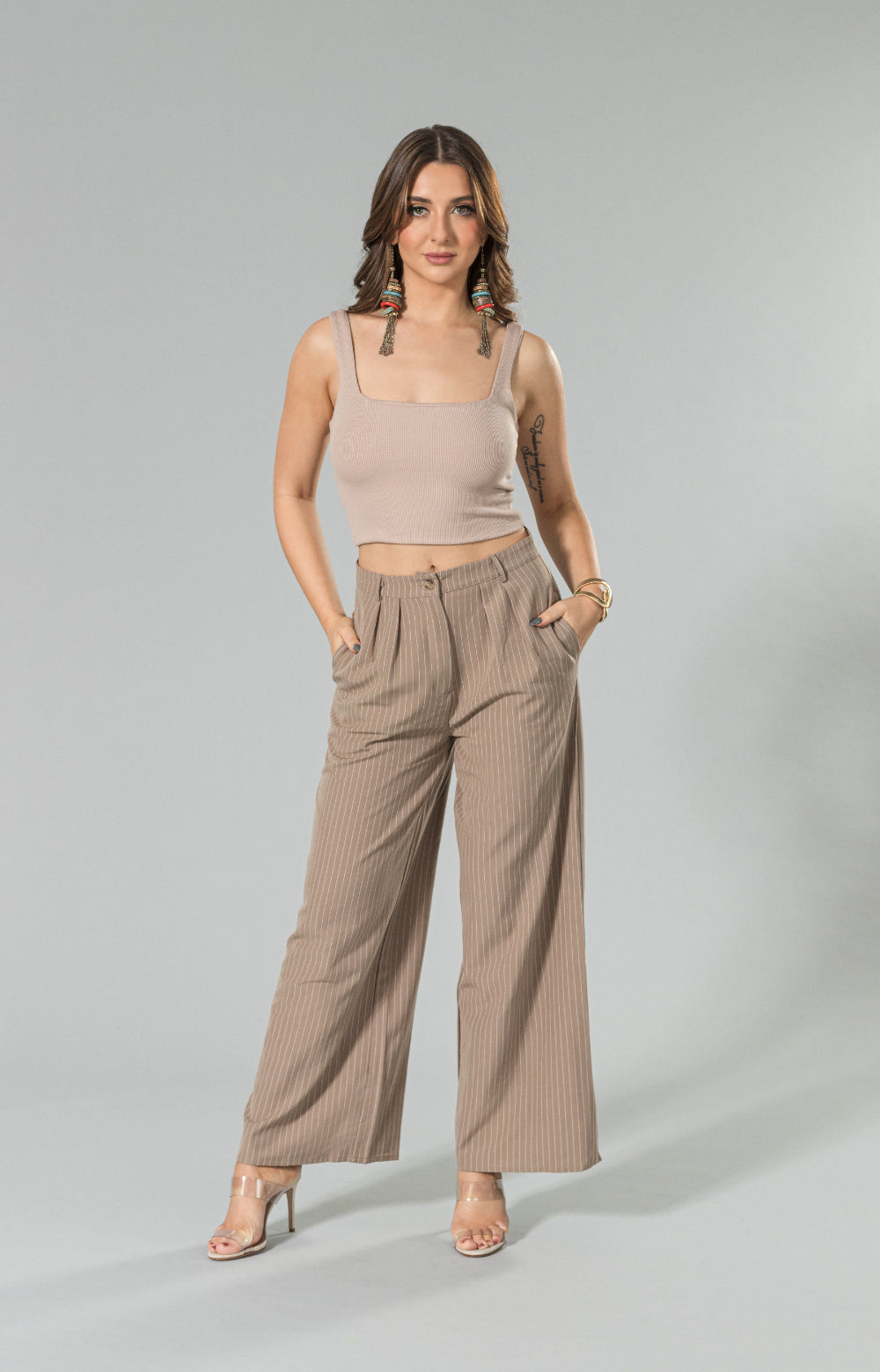 Introducing our Tia rib crop top, your new go-to wardrobe staple! Made from super soft and buttery fabric, this crop top offers unbeatable comfort all day long. With its stretchy material, it provides a wonderful body-hugging fit that flatters your curves. Perfect for everyday wear or dressing up for a night out, this rib crop top will quickly become a must-have in your closet.
