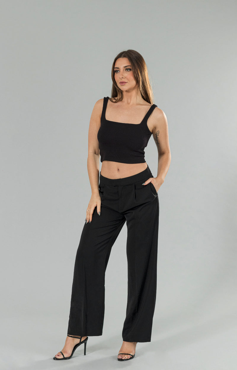 Introducing our Tia rib crop top, your new go-to wardrobe staple! Made from super soft and buttery fabric, this crop top offers unbeatable comfort all day long. With its stretchy material, it provides a wonderful body-hugging fit that flatters your curves. Perfect for everyday wear or dressing up for a night out, this rib crop top will quickly become a must-have in your closet.